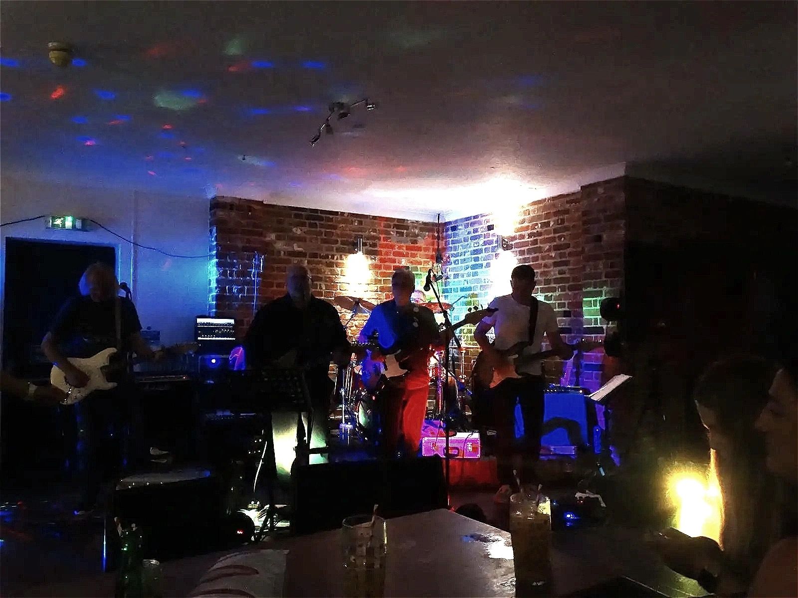 Live covers band performing at a wedding reception