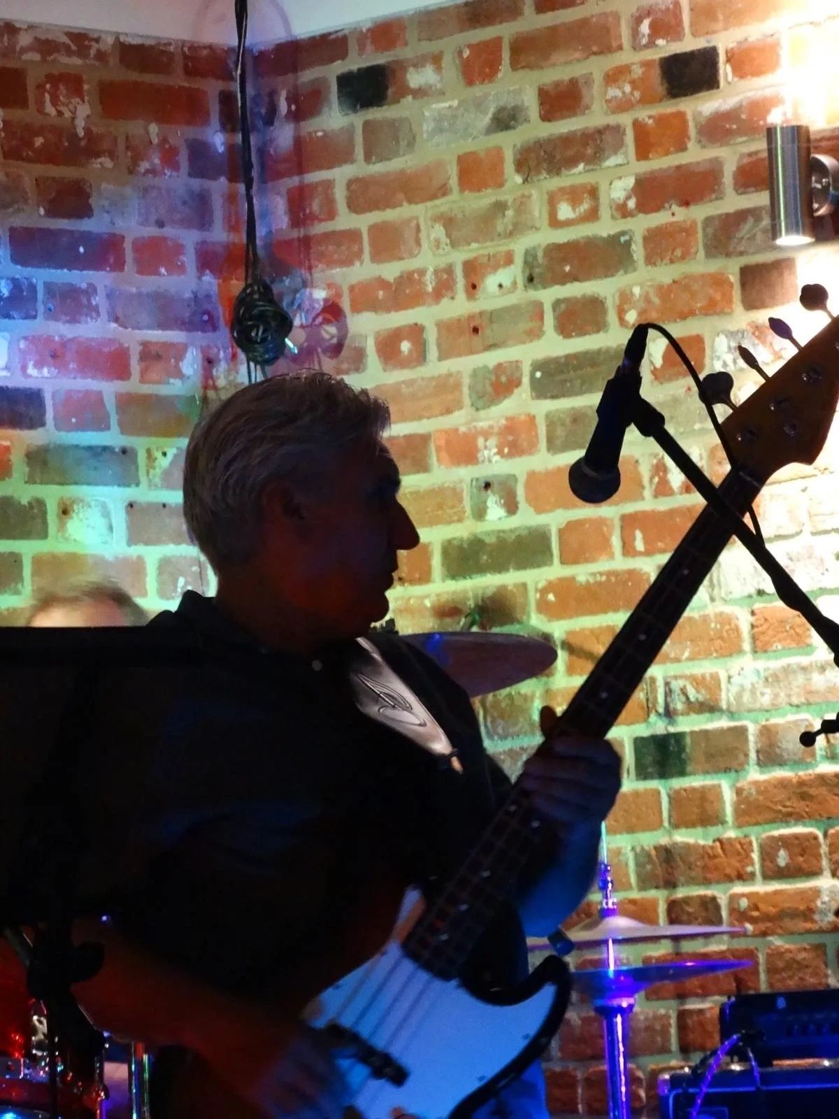 Live wedding band performing for a dancing crowd